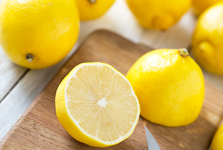lemons on cutting board
