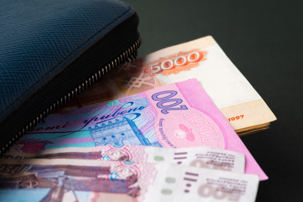 money and wallet on table