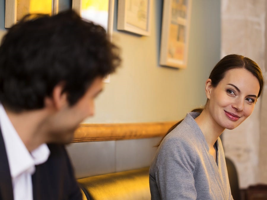 man and woman looking each other