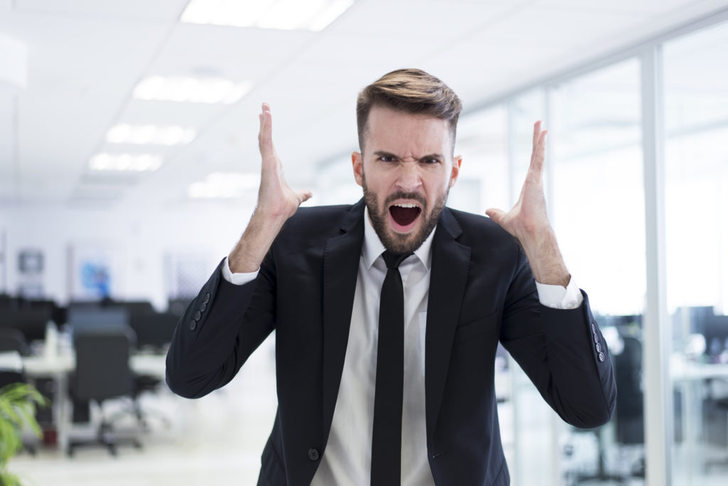Angry man in suit 