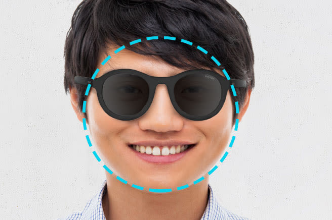 round face shape man wearing sunglasses