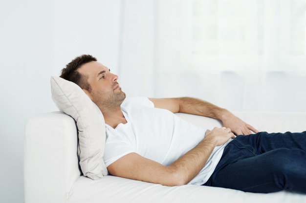 lazy man resting on sofa