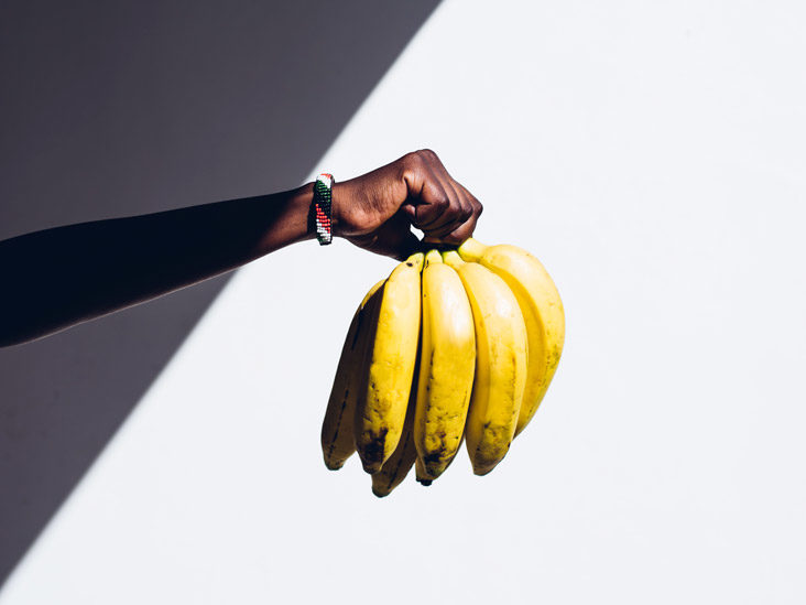 hand holding banana