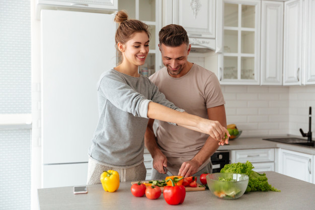 couple cooking together