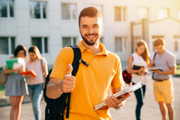 young man with yellow shirt