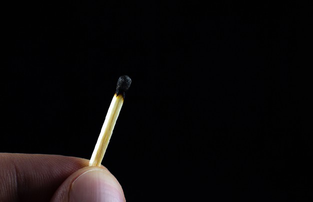 extinct-match-man-s-hand-death-concept