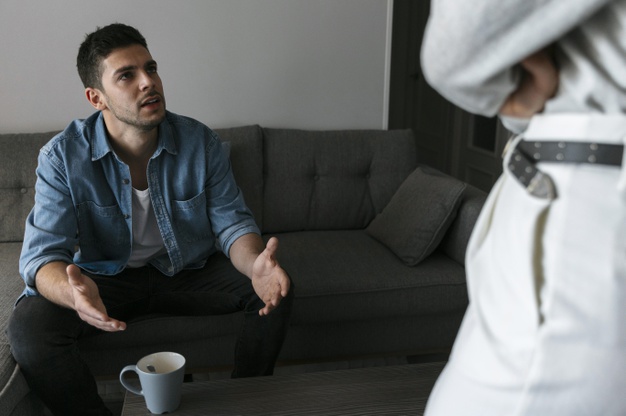 Husband and wife having a fight indoors