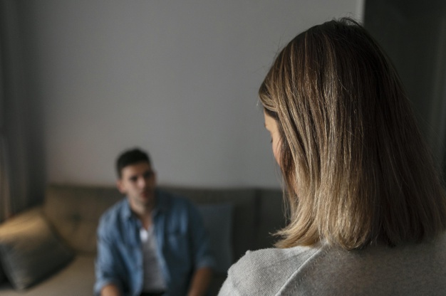 Husband and wife having a fight indoors