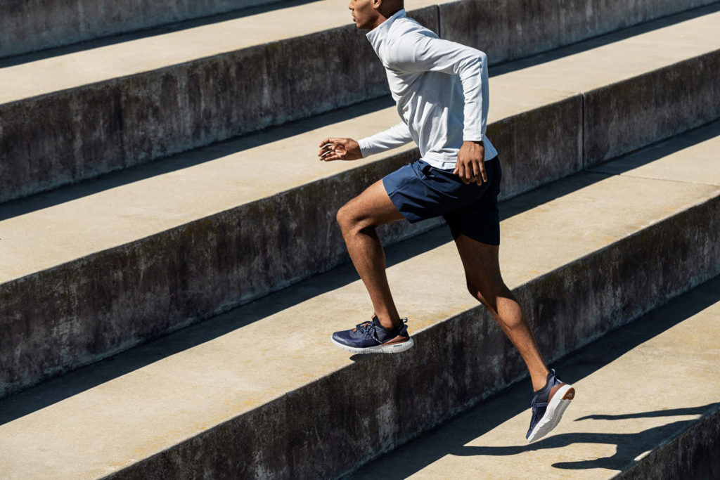 man running up the stairs