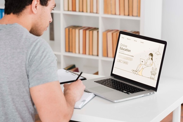man taking online courses