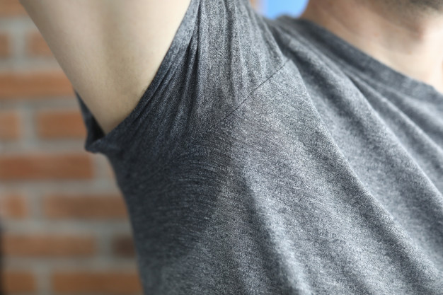 man-sweaty-armpit-with-raised-hand