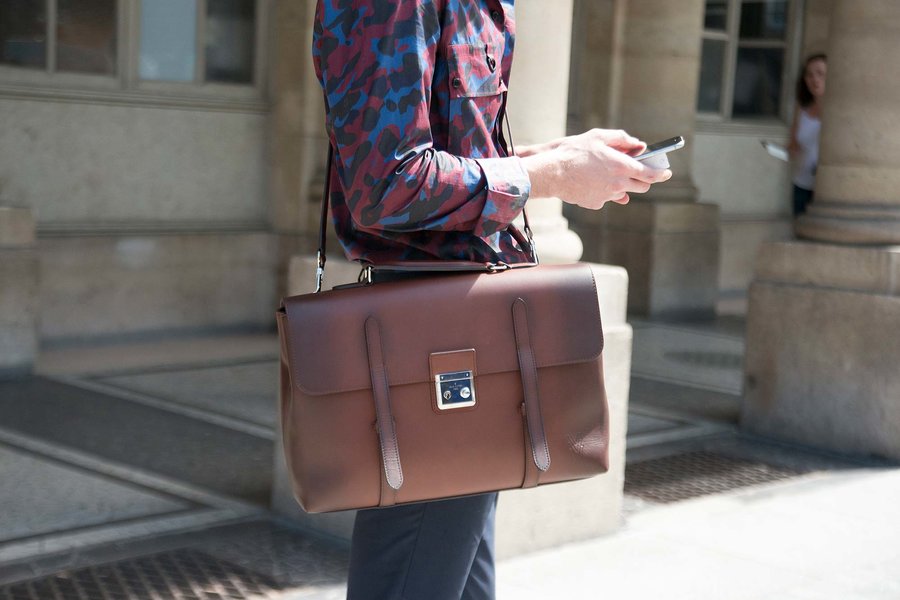 Side view of man with Messenger Bag