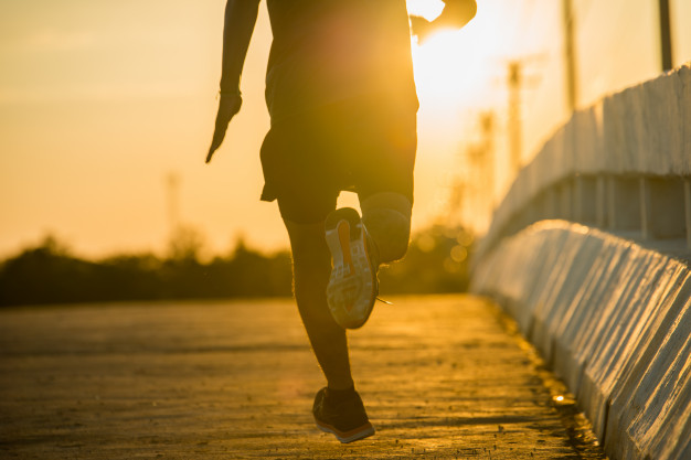 silhouette-young-fitness-man-running-sunrise