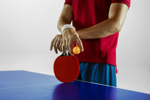 Young man playing table tennis
