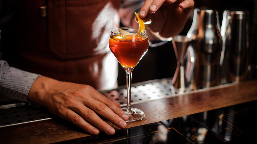 bartender-garnishing-cocktail
