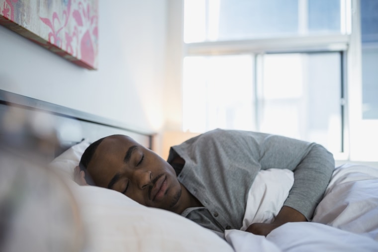 Man Sleeping In Bed 