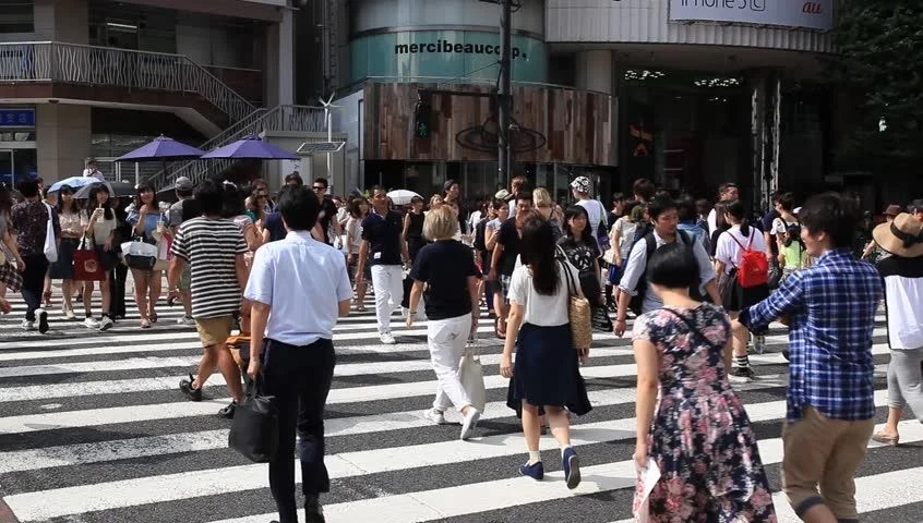 Japanese people crossing the road