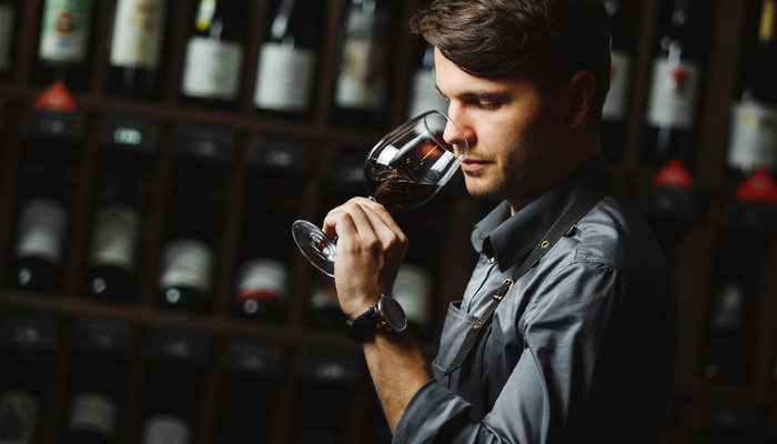 man-tasting-red-wine
