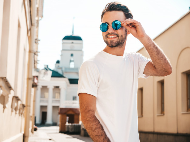 man-with-sunglasses-wearing-white-t-shirt-posing