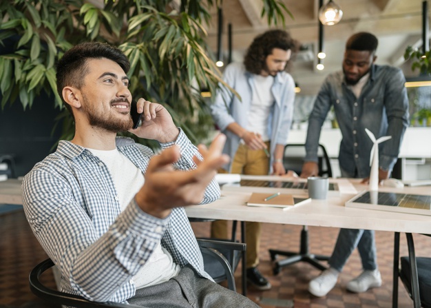 smiley man talking on phone