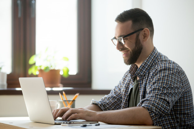 male writing positive mail to client 