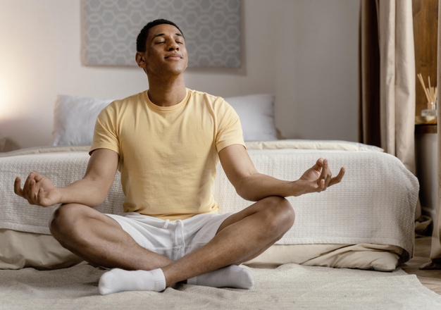 portrait-man-home-meditating