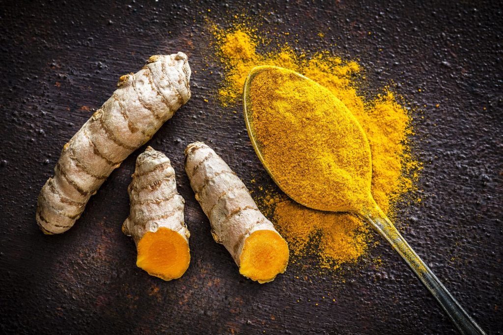 turmeric-roots-and-powder-shot-from-above