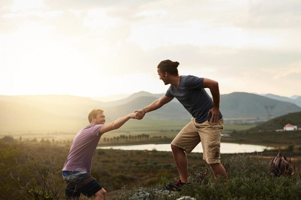 man Pulling his friend