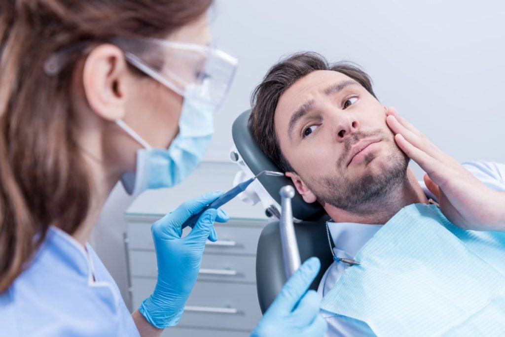 man visit dental clinic