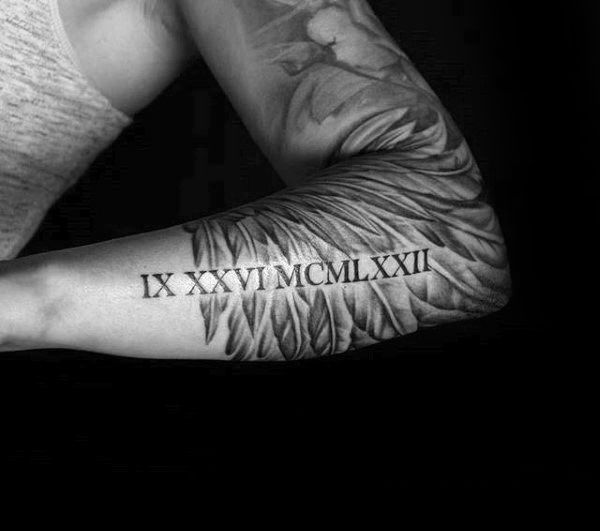 Roman Numeral and Wings Tattoo 