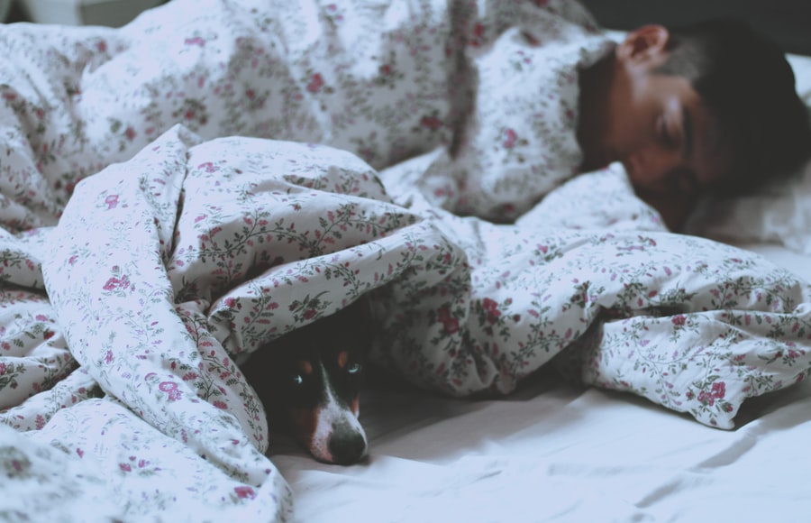 Man sleeping with a dog