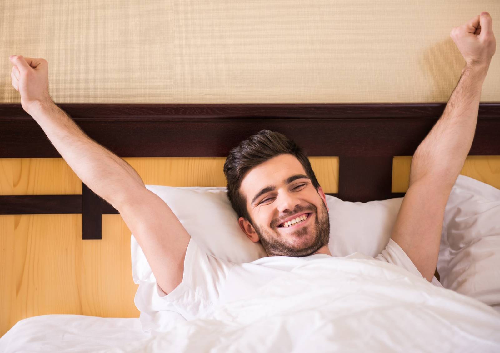 Happy Man Waking Up In The Morning  