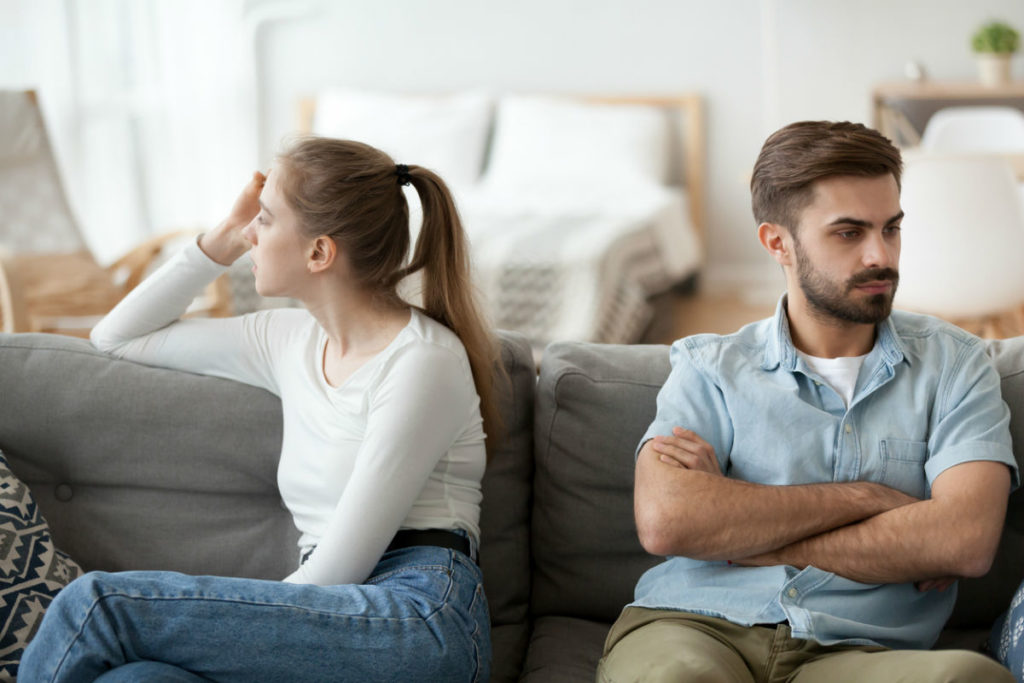 Couple Sit On Couch Back To Back Avoid Talking After Fight, Offended Man And Woman