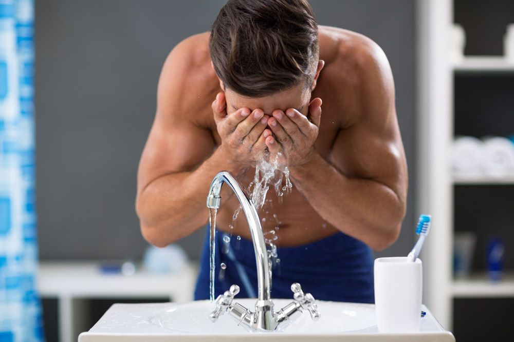 Man washing face 