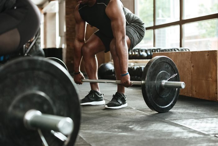 Man Weight Lifting in gym 