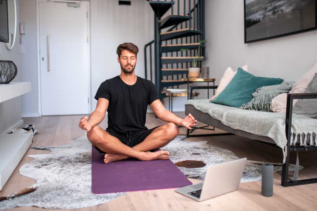  young man meditating 