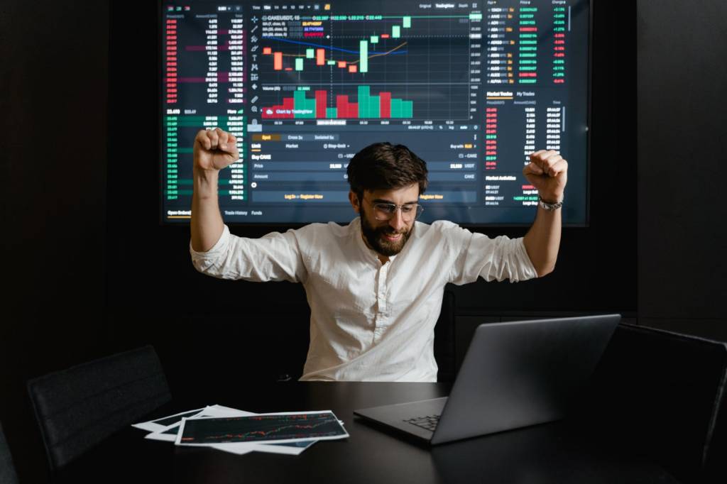 Man In Front of Chart