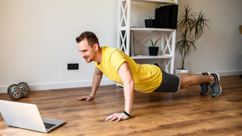 man doing Workout exercise fitness online 