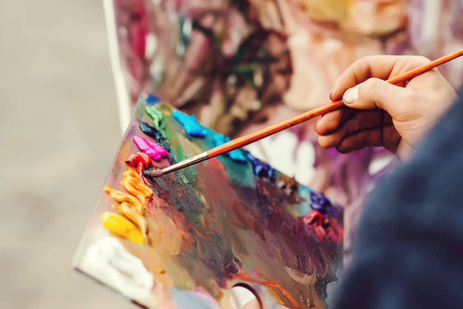 Man Painting Canvas