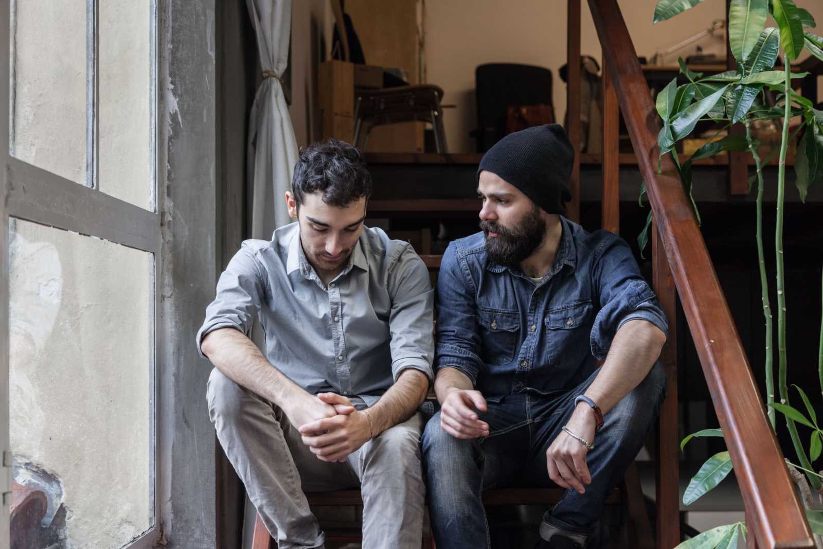 Two Men Serious Conversation 