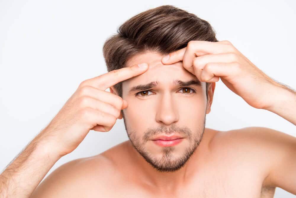 Types of skin problems on the face which are commonly observed in men 