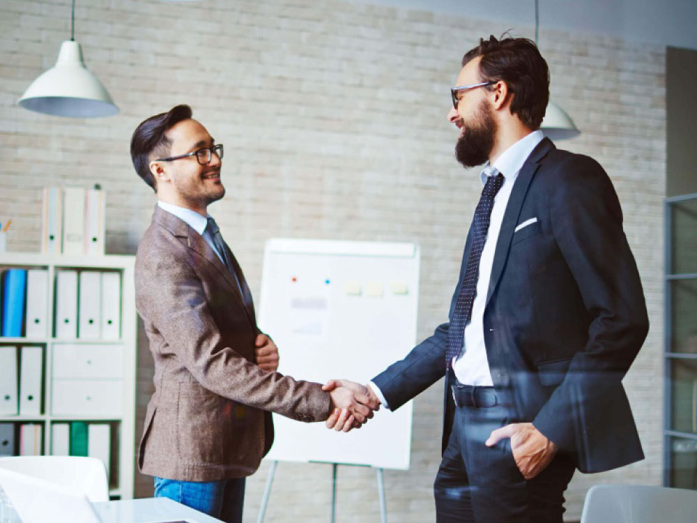  Two business man shaking hands