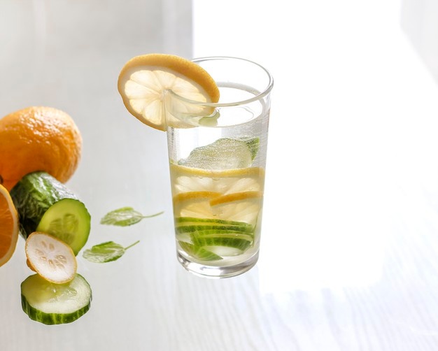  Water with lemon and cucumber in a glass.detox drink