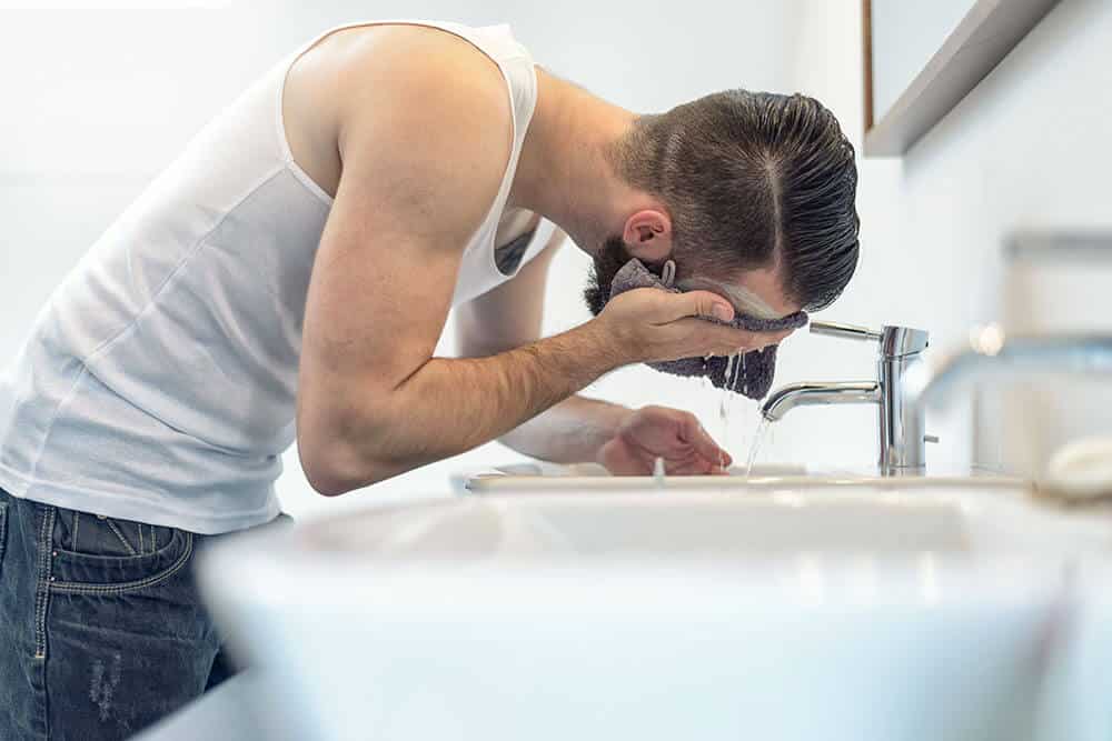 Man Washing Face