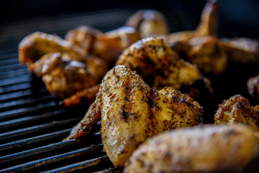 Chicken wings on the grill.