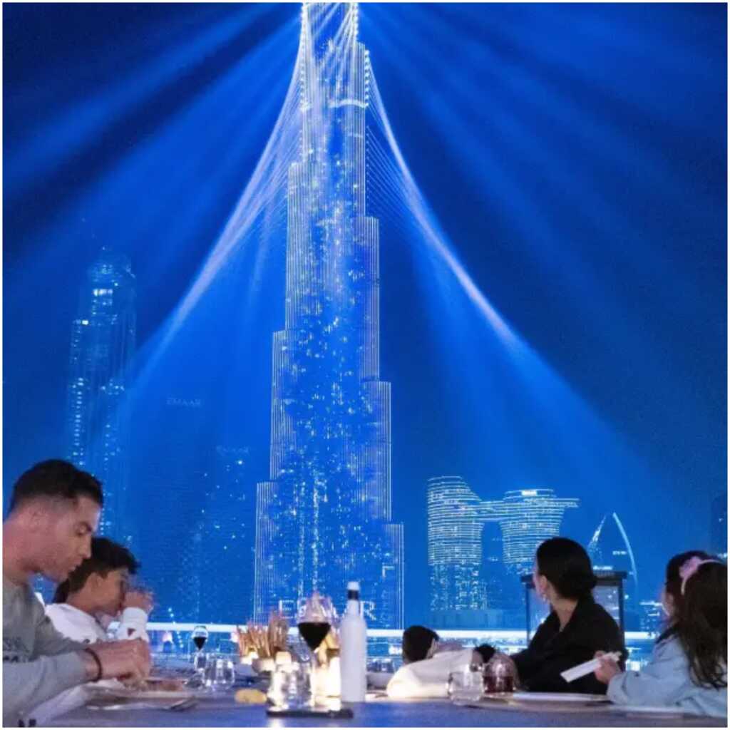 The family ate dinner while admiring the amazing view