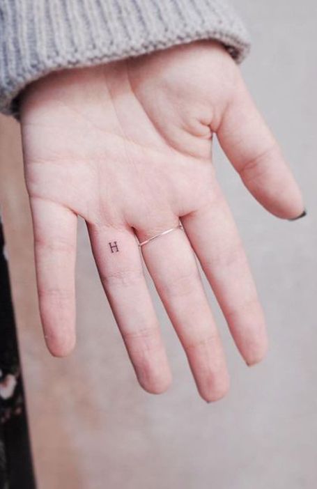 Inner Finger Tattoo