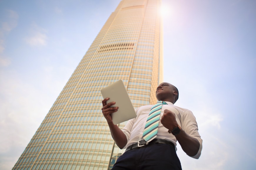 Man In Front Of The Building