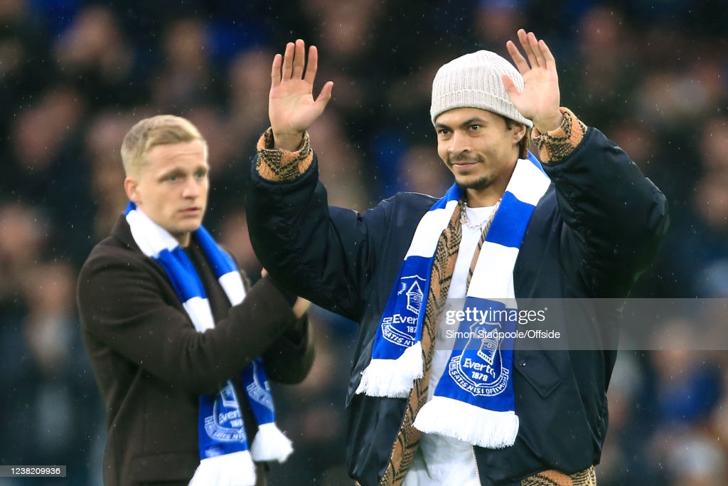 New Everton signings Dele Alli (R) and Donny van de Beek make an appearance on the pitch at half-time during the Emirates FA Cup Fourth Round match between Everton and Brentford at Goodison Park on February 5, 2022 in Liverpool, England.