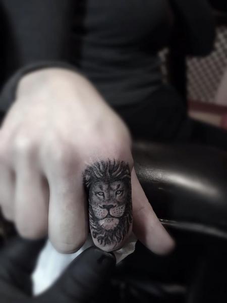 Lion Finger Tattoo